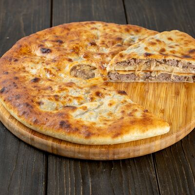 Осетинский пирог с мясом и капустой в Осетинские пироги Вкусно Пироги по цене 1000