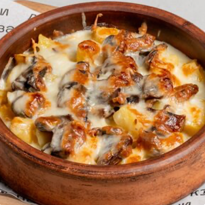 Картофель с грибами под сыром в Джованни по цене 535 ₽