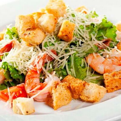 Салат Цезарь с креветками в Мимино по цене 990 ₽