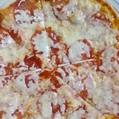 Пицца Маргаритав Оазис кафе по цене 690 ₽