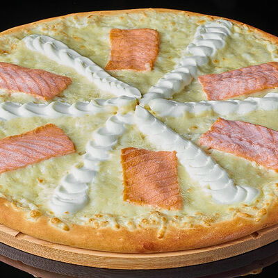 Пицца Филадельфияв Экспресс суши De Luxe по цене 1290 ₽