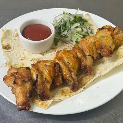 Куриные крылышкив Сказка lounge по цене 520 ₽