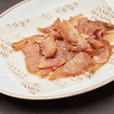 Сыровяленая свинина в The James Shark Pub по цене 400 ₽