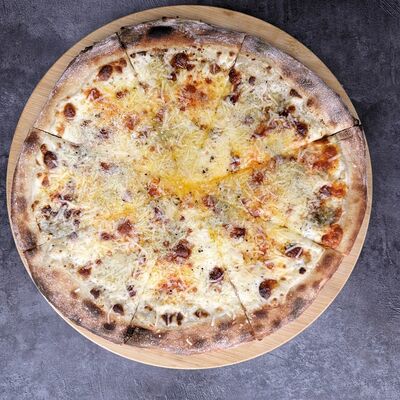 Четыре сыра в Atomic pizza по цене 990 ₽