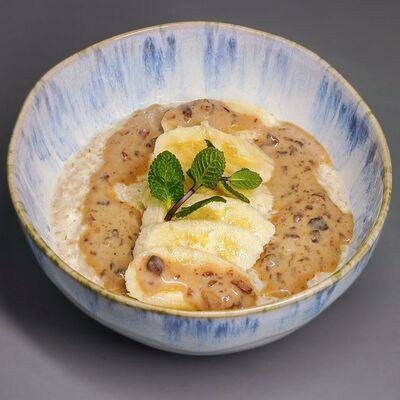 Овсяная каша с бананом и орехами в Рановский Рест по цене 290 ₽