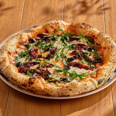 Пицца Вяленые томаты и оливки в Russo Italiano по цене 650 ₽