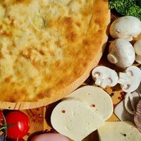 Осетинский пирог с курицей, сыром и грибами в Осетинские пироги