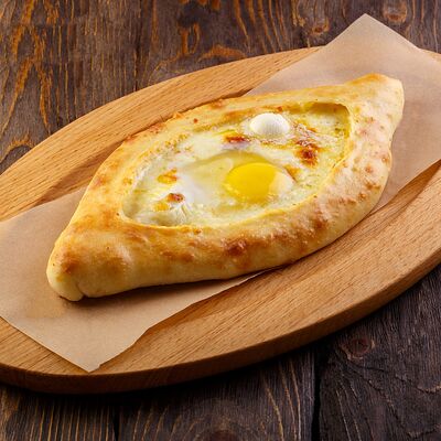 Хачапури по-аджарски в У Ханумы по цене 550 ₽