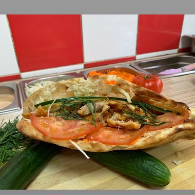 Шаурма в пите с курицей и сыромв Dana по цене 570 ₽