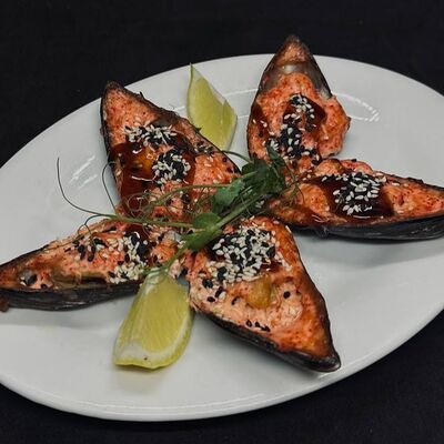 Мидии киви запеченныев Кафе сон у моря по цене 550 ₽