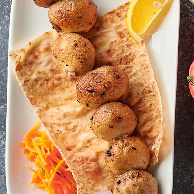 Шампиньоны на углях в Чайхана Райхан по цене 325 ₽