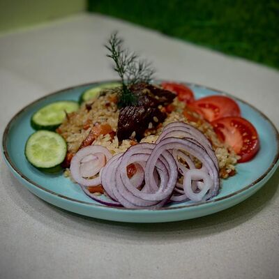 Плов в Хинкальная Едим вкусно по цене 430 ₽