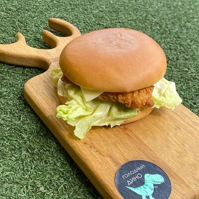 Чикен-бургер в Желтый фудтрак Голодный Дино по цене 400 ₽