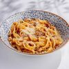 Тальятелле с говяжьими щеками в томатном соусе в Vinch по цене 900