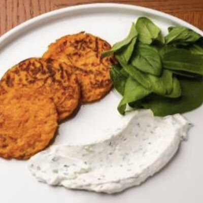 Драники с тыквой и морковью в Тревеллерс кофе по цене 379 ₽