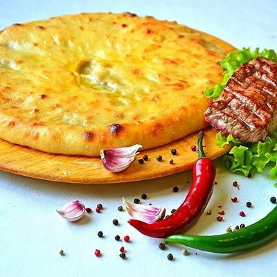 Осетинский пирог с рубленным мясом в Осетинские пироги от Забавы по цене 1800 ₽