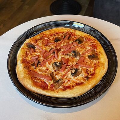 Пицца с ветчиной и грибами в Блеск по цене 390