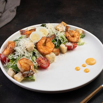 Цезарь с креветками в Ellips по цене 830 ₽