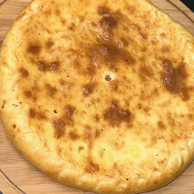 Осетинский пирог с капустой в Грузинский дом по цене 999 ₽