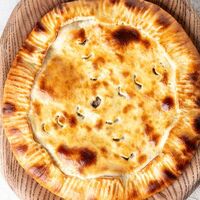 Мясной пирог кубдари в ODA