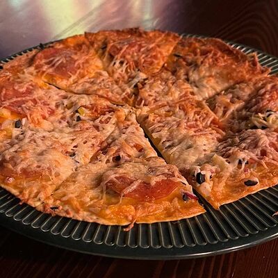 Мини-пицца с пепперони в Зеленая фея по цене 450 ₽