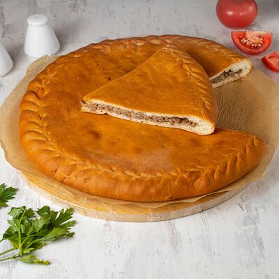 Осетинский пирог с мясом в Хлебное место по цене 1350 ₽