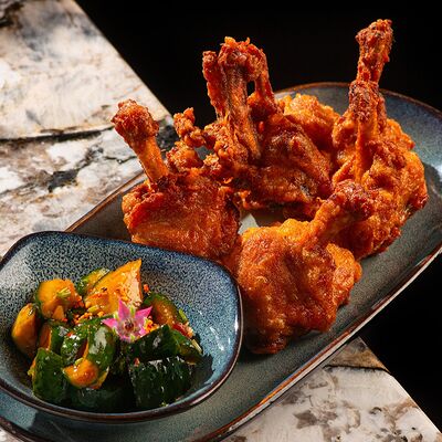 Хрустящие куриные крылышкив Hookah Place по цене 600 ₽