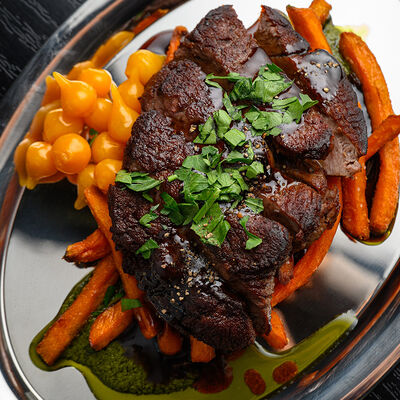 Стейк из говядины с бататом фри в Шалом Берман по цене 1250 ₽