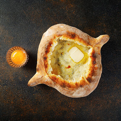 Хачапури по-аджарски в Shemodi Шемоди по цене 590 ₽