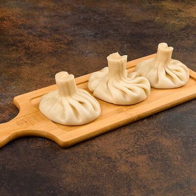 Хинкали с бараниной в Кинза по цене 385 ₽