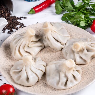 Хинкали с грибами в Тамада по цене 550 ₽