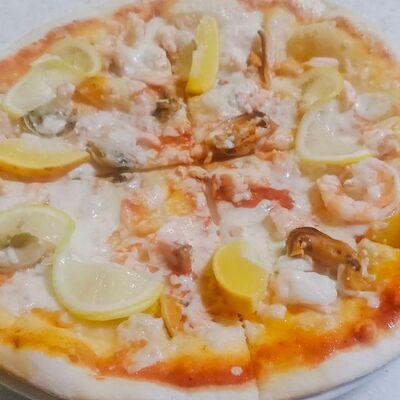 Пицца Дельмарв Оазис кафе по цене 950 ₽