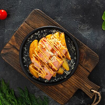 Картофель, запечённый дольками с беконом в Багетофф по цене 319 ₽