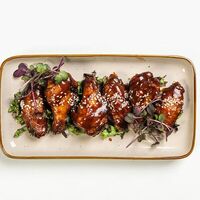 Куриные крылышки с соусом BBQ в Aura Shubar