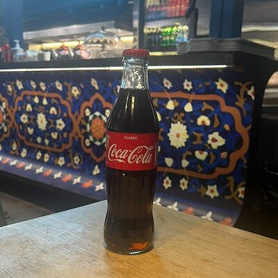 Coca-Cola бутылка 0.33 в Плов лагман по цене 220 ₽