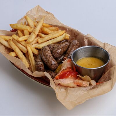 Фирменные говяжьи колбаски Bite в PINTA Bar & Grill по цене 4690 ₸