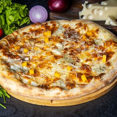 Четыре сыра в Марко пицца по цене 1040 ₽