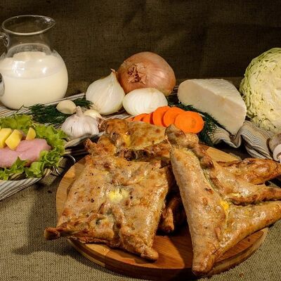 Чукуры с ветчиной и сыром в Пироги по-коми по цене 1268 ₽