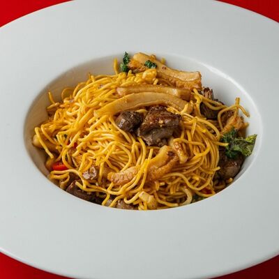 Яичная лапша с желудками, печенью и куриными сердечками в Китайская грамота по цене 650 ₽