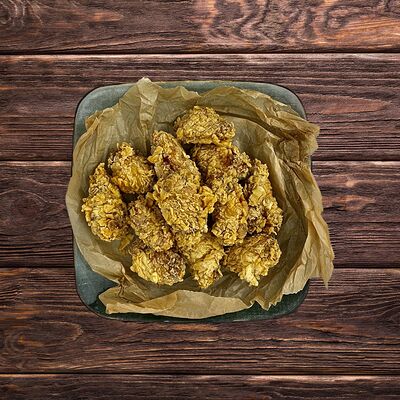 Куриные крылышки в сухарях панко в Фрегата Латина по цене 435 ₽