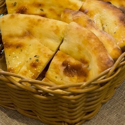 Лепешки фирменные с травами в Парус по цене 300 ₽