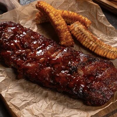 Свиные ребра в соусе BBQ с пикантной кукурузой в Пламя и Вино по цене 1490 ₽