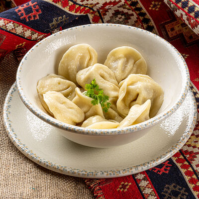 Пельмени домашние в Хмели & Сунели по цене 580 ₽