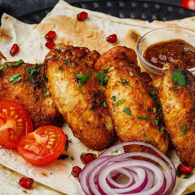 Шашлык из куриных крылышек в Мангал холл по цене 810 ₽