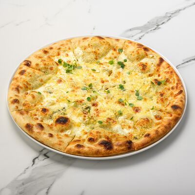 Пицца Четыре сыра в Bruni Prosecco Bar по цене 1590 ₽