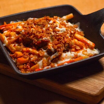 Картофельный путин с рваной свининой в Co.mein по цене 550 ₽