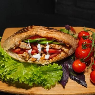 Донер с курицей в Мангал Кебаб по цене 480 ₽