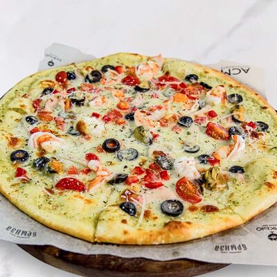 Пицца с морепродуктами в МОРЕ по цене 990 ₽