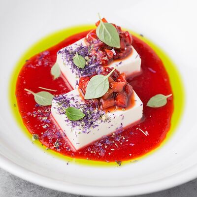 Базиликовая панна-котта в Osteria Mario по цене 530 ₽