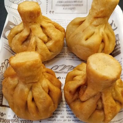 Хинкали во фритюре со свининой и говядиной в Встречи у моря по цене 560 ₽